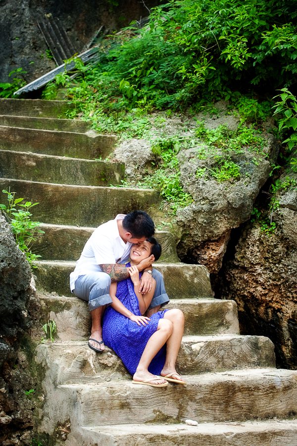 Bunn Salarzon - guy and girl kiss sitting on stairs