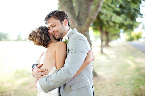 Bunn Salarzon - groom embraces bride