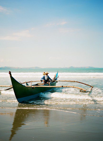 Bunn Salarzon - old fishing boat in the ocean