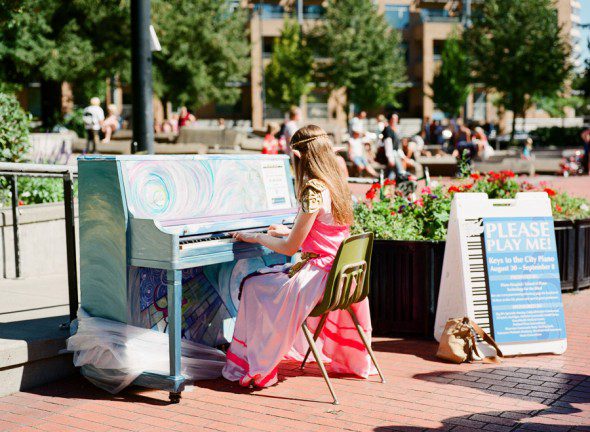 Bunn Salarzon - fair elf playing piano in the park