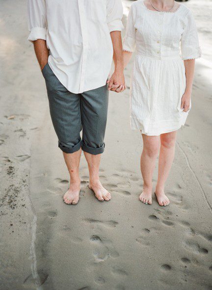 Bunn Salarzon - shots of man and woman's barefoot on sand