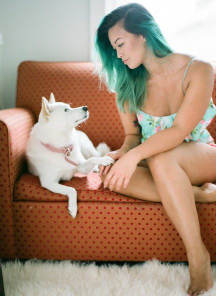 Bunn Salarzon - beautiful woman sitting with white dog